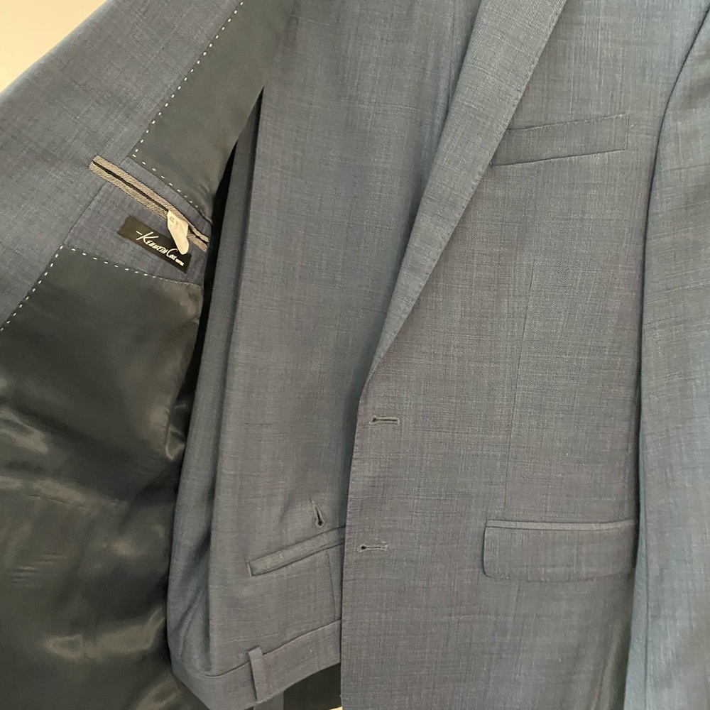 Kenneth Cole Blue two piece suit size 40 L and pants 34 w. Like new worn 5 times
